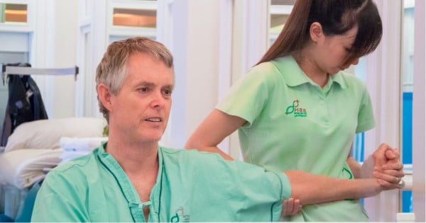 Jack Pearce with BBH nurse during therapy